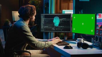 Man being asked existential questions by awaken AI on green screen PC, gaining consciousness. IT professional speaking with artificial intelligence on chroma key PC, camera A photo