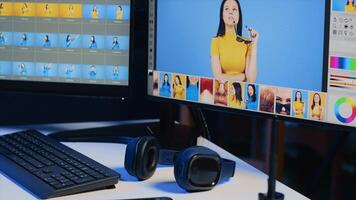 Photo retouching software interface on computer in empty photography studio, close up. Photography organizing program displayed on multi monitors PC setup on multimedia company desk, panning shot