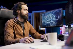 Software developer using computer for artificial intelligence computing simulating human brain through self learning algorithms. IT specialist working with AI deep neural networks on desktop PC photo