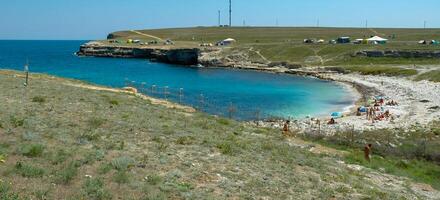 View of the bay between Cape Priboyny and Tarkhankutsky in the tract Dzhangul, western Crimea photo