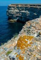 Steep karst limestone shores and rocks in the Dzhangul tract, western Crimea, Tarkhankut photo
