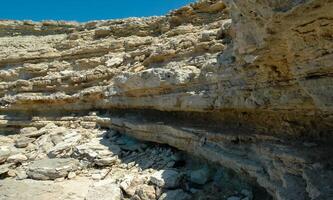 Steep karst limestone shores and rocks in the Dzhangul tract, western Crimea, Tarkhankut photo