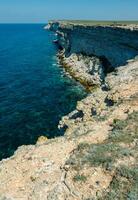 Steep karst limestone shores and rocks in the Dzhangul tract, western Crimea, Tarkhankut photo