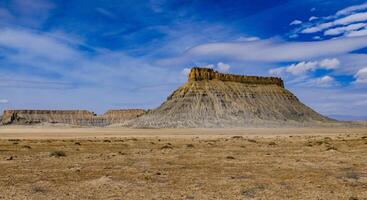 Factory Butte is a summit in Wayne County, Utah, US photo