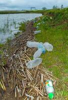 Environmental pollution, plastic garbage on the shore of lake Yalpug, Ukraine photo