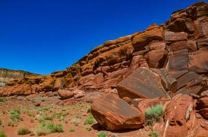 Layered geological formations of red rocks in Canyonlands National Park is in Utah near Moab. photo