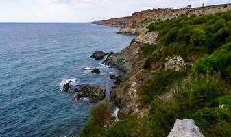 Black Sea near rocky shore in eastern Crimea. photo