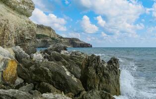 Black Sea near rocky shore in eastern Crimea. photo
