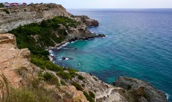 Black Sea near rocky shore in eastern Crimea. photo