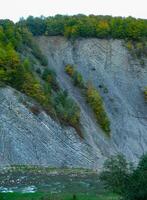 Geology of the mountains of Ukraine, Layered sloping rocks in the Ivano-Frankivsk region, Ukraine photo