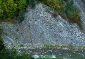 Geology of the mountains of Ukraine, Layered sloping rocks in the Ivano-Frankivsk region, Ukraine photo