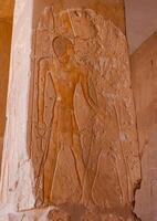 EGYPT, LUXOR - MARCH 01, 2019 archaeological site, drawings and geoglyphs on the walls of an ancient temple, the temple of Hatshepsut near Luxor in Egypt photo