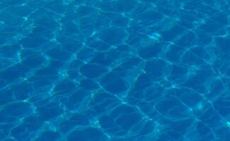 The reflection of the suns rays in the water in the pool with sea water, The glare of the sun, Egypt photo