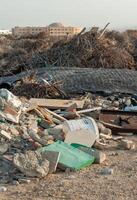 Plastic bottles and various garbage from hotels in the wild, Garbage dump in the desert in Egypt photo