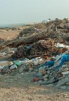 Plastic bottles and various garbage from hotels in the wild, Garbage dump in the desert in Egypt photo