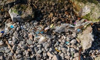Plastic garbage and microplastics on the shore of Khadzhibey Estuary photo