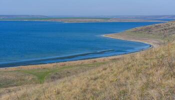 Steppe landscape, shore of the Tiligul estuary in spring, south of Ukraine photo