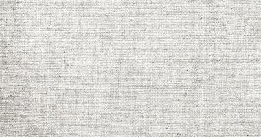 Natural Linen Material Textile Canvas Fabric Texture Background Close-up Detail of Fabric Natural Color Hemp Material Pattern Design Wallpaper. Can be Used as Background or For Graphic Design photo