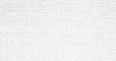 Natural Linen Material Textile Canvas Fabric Texture Background Close-up Detail of Fabric Natural Color Hemp Material Pattern Design Wallpaper. Can be Used as Background or For Graphic Design photo