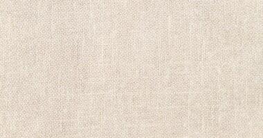 Natural Linen Material Textile Canvas Fabric Texture Background Close-up Detail of Fabric Natural Color Hemp Material Pattern Design Wallpaper. Can be Used as Background or For Graphic Design photo