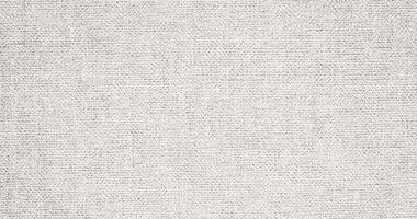 Natural Linen Material Textile Canvas Fabric Texture Background Close-up Detail of Fabric Natural Color Hemp Material Pattern Design Wallpaper. Can be Used as Background or For Graphic Design photo