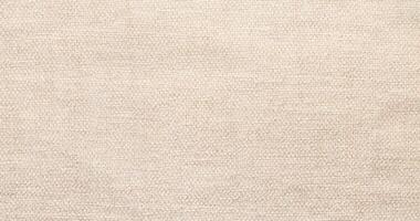 Natural Linen Material Textile Canvas Fabric Texture Background Close-up Detail of Fabric Natural Color Hemp Material Pattern Design Wallpaper. Can be Used as Background or For Graphic Design photo
