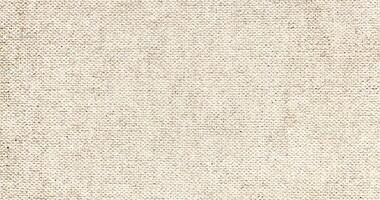 Natural Linen Material Textile Canvas Fabric Texture Background Close-up Detail of Fabric Natural Color Hemp Material Pattern Design Wallpaper. Can be Used as Background or For Graphic Design photo