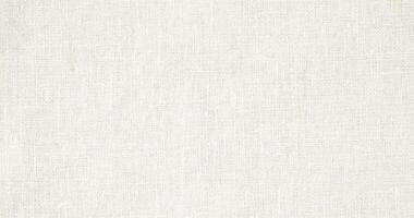 Natural Linen Material Textile Canvas Fabric Texture Background Close-up Detail of Fabric Natural Color Hemp Material Pattern Design Wallpaper. Can be Used as Background or For Graphic Design photo
