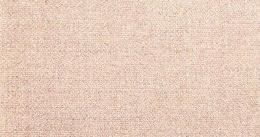 Natural Linen Material Textile Canvas Fabric Texture Background Close-up Detail of Fabric Natural Color Hemp Material Pattern Design Wallpaper. Can be Used as Background or For Graphic Design photo