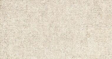 Natural Linen Material Textile Canvas Fabric Texture Background Close-up Detail of Fabric Natural Color Hemp Material Pattern Design Wallpaper. Can be Used as Background or For Graphic Design photo