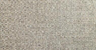 Natural Linen Material Textile Canvas Fabric Texture Background Close-up Detail of Fabric Natural Color Hemp Material Pattern Design Wallpaper. Can be Used as Background or For Graphic Design photo