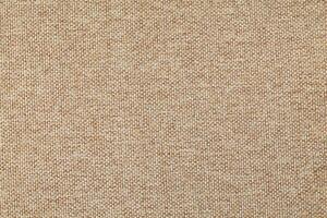 Natural Linen Material Textile Canvas Fabric Texture Background Close-up Detail of Fabric Natural Color Hemp Material Pattern Design Wallpaper. Can be Used as Background or For Graphic Design photo