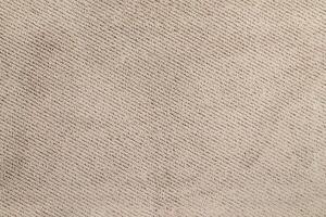 Natural Linen Material Textile Canvas Fabric Texture Background Close-up Detail of Fabric Natural Color Hemp Material Pattern Design Wallpaper. Can be Used as Background or For Graphic Design photo