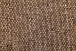 Natural Linen Material Textile Canvas Fabric Texture Background Close-up Detail of Fabric Natural Color Hemp Material Pattern Design Wallpaper. Can be Used as Background or For Graphic Design photo