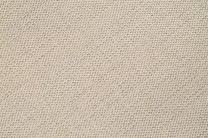 Natural Linen Material Textile Canvas Fabric Texture Background Close-up Detail of Fabric Natural Color Hemp Material Pattern Design Wallpaper. Can be Used as Background or For Graphic Design photo