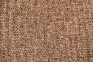 Natural Linen Material Textile Canvas Fabric Texture Background Close-up Detail of Fabric Natural Color Hemp Material Pattern Design Wallpaper. Can be Used as Background or For Graphic Design photo
