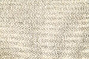 Natural Linen Material Textile Canvas Fabric Texture Background Close-up Detail of Fabric Natural Color Hemp Material Pattern Design Wallpaper. Can be Used as Background or For Graphic Design photo