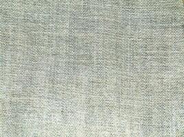 Natural Linen Material Textile Canvas Fabric Texture Background Close-up Detail of Fabric Natural Color Hemp Material Pattern Design Wallpaper. Can be Used as Background or For Graphic Design photo