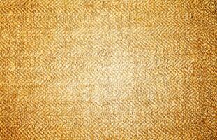 Natural Linen Material Textile Canvas Fabric Texture Background Close-up Detail of Fabric Natural Color Hemp Material Pattern Design Wallpaper. Can be Used as Background or For Graphic Design photo