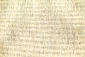 Natural Linen Material Textile Canvas Fabric Texture Background Close-up Detail of Fabric Natural Color Hemp Material Pattern Design Wallpaper. Can be Used as Background or For Graphic Design photo