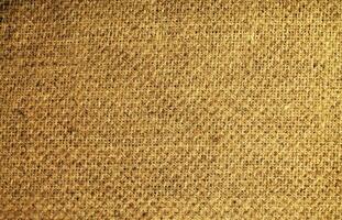 Natural Linen Material Textile Canvas Fabric Texture Background Close-up Detail of Fabric Natural Color Hemp Material Pattern Design Wallpaper. Can be Used as Background or For Graphic Design photo