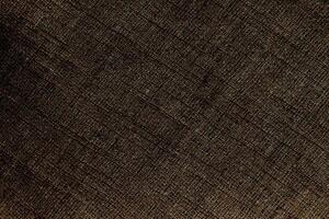 Natural Linen Material Textile Canvas Fabric Texture Background Close-up Detail of Fabric Natural Color Hemp Material Pattern Design Wallpaper. Can be Used as Background or For Graphic Design photo