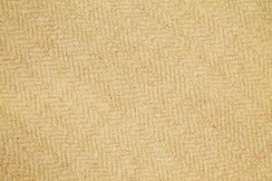 Natural Linen Material Textile Canvas Fabric Texture Background Close-up Detail of Fabric Natural Color Hemp Material Pattern Design Wallpaper. Can be Used as Background or For Graphic Design photo