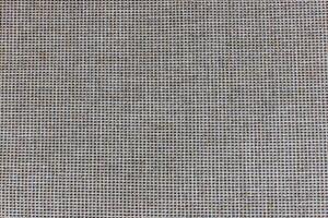 Natural Linen Material Textile Canvas Fabric Texture Background Close-up Detail of Fabric Natural Color Hemp Material Pattern Design Wallpaper. Can be Used as Background or For Graphic Design photo