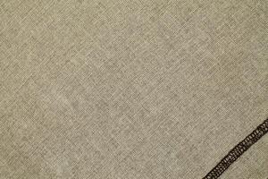 Natural Linen Material Textile Canvas Fabric Texture Background Close-up Detail of Fabric Natural Color Hemp Material Pattern Design Wallpaper. Can be Used as Background or For Graphic Design photo