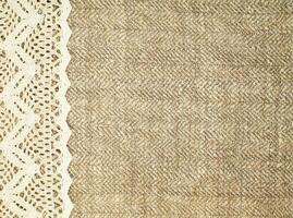 Natural Linen Material Textile Canvas Fabric Texture Background Close-up Detail of Fabric Natural Color Hemp Material Pattern Design Wallpaper. Can be Used as Background or For Graphic Design photo