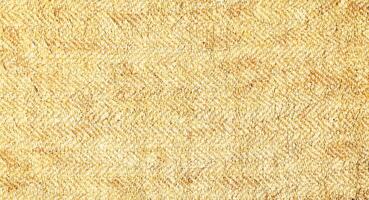 Natural Linen Material Textile Canvas Fabric Texture Background Close-up Detail of Fabric Natural Color Hemp Material Pattern Design Wallpaper. Can be Used as Background or For Graphic Design photo