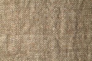 Natural Linen Material Textile Canvas Fabric Texture Background Close-up Detail of Fabric Natural Color Hemp Material Pattern Design Wallpaper. Can be Used as Background or For Graphic Design photo