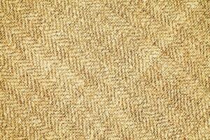 Natural Linen Material Textile Canvas Fabric Texture Background Close-up Detail of Fabric Natural Color Hemp Material Pattern Design Wallpaper. Can be Used as Background or For Graphic Design photo