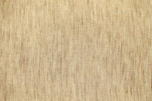 Natural Linen Material Textile Canvas Fabric Texture Background Close-up Detail of Fabric Natural Color Hemp Material Pattern Design Wallpaper. Can be Used as Background or For Graphic Design photo